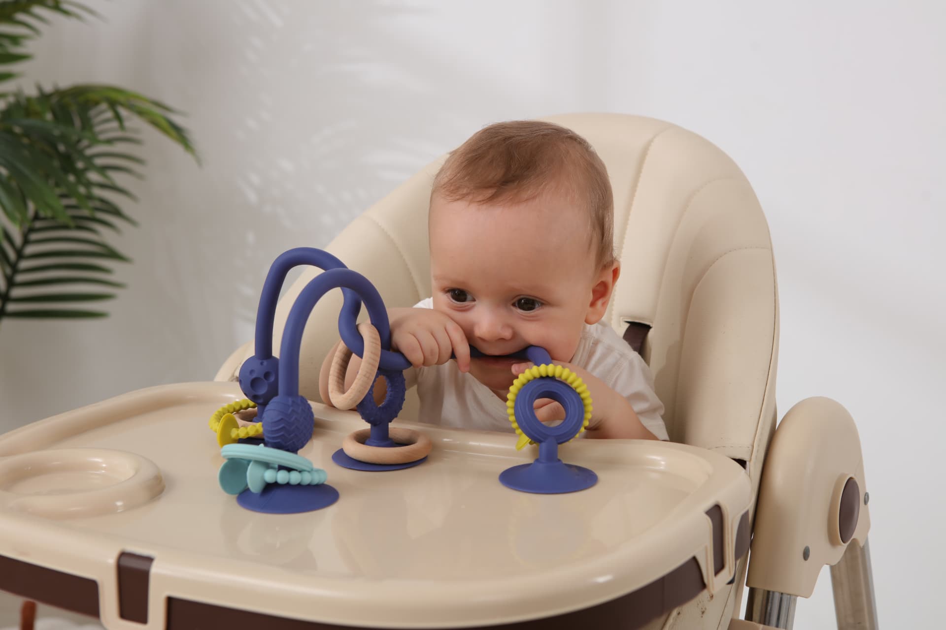 Jumble Jangle wooden rattle and roller toy for babies learning to grasp