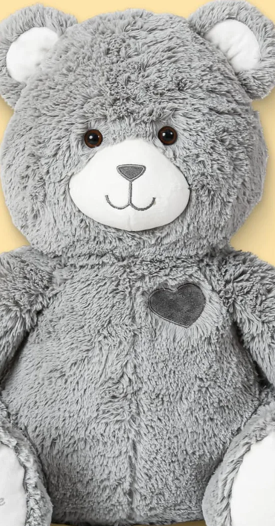 Close-up of the embroidered heart on the Jumble Bear weighted plush